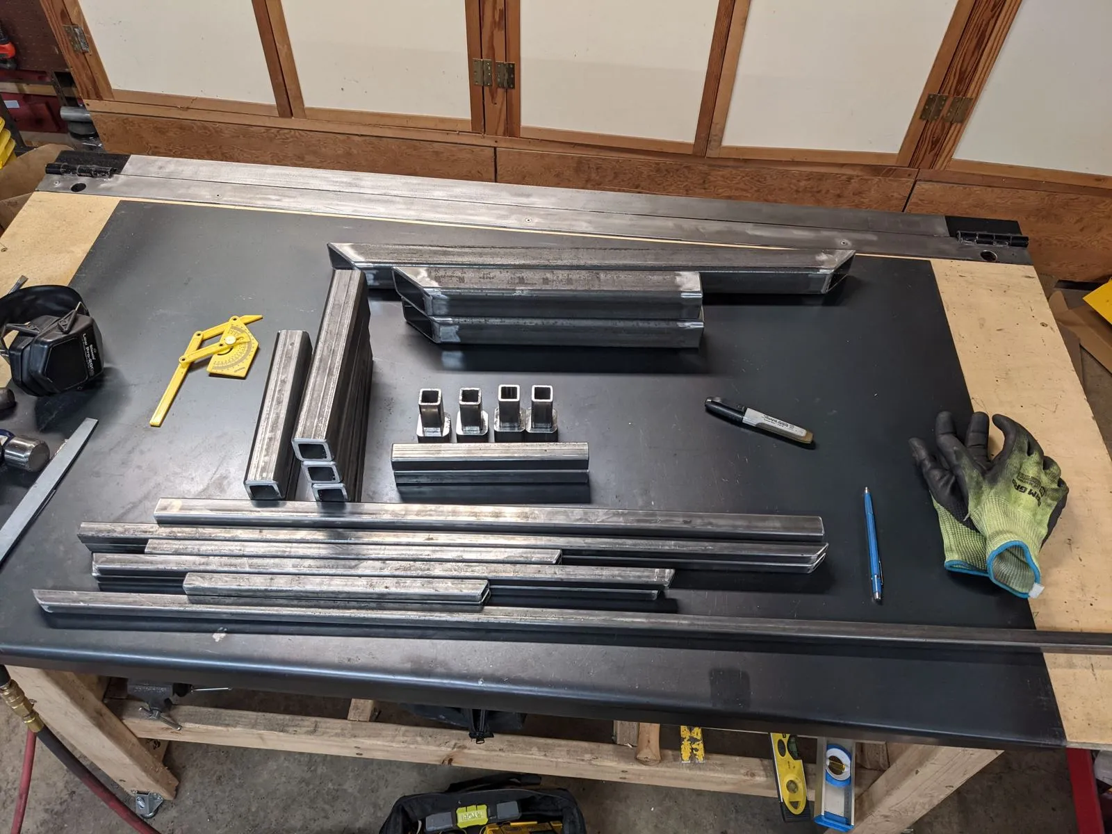 Bed and upper frame tubes cut and prepped on the welding table