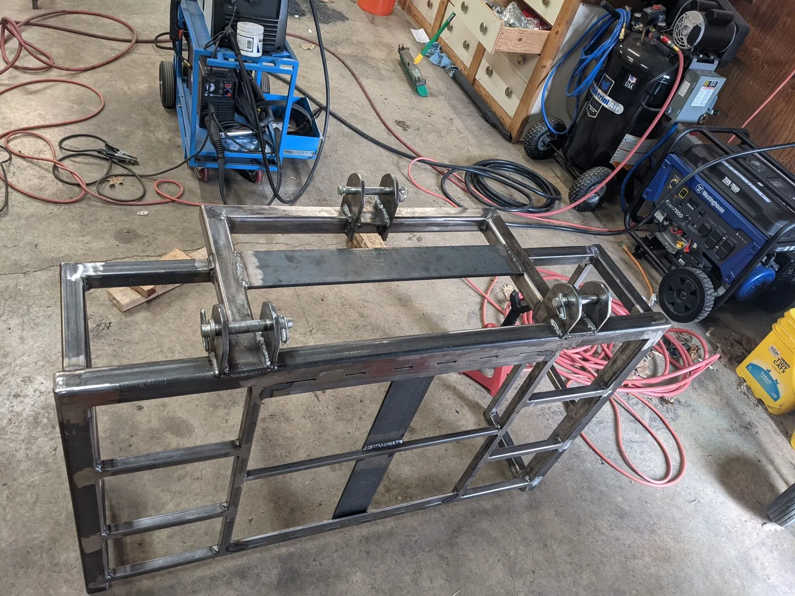 The three-point brackets and center frame reinforcement welded in
