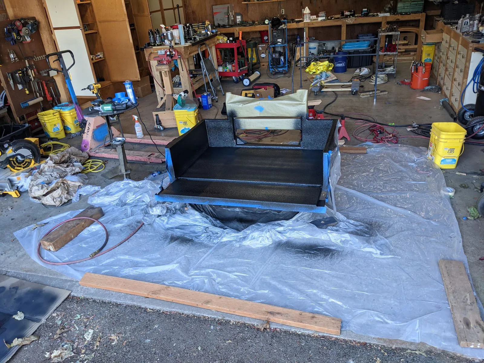 The painted carry-all with the bed lined