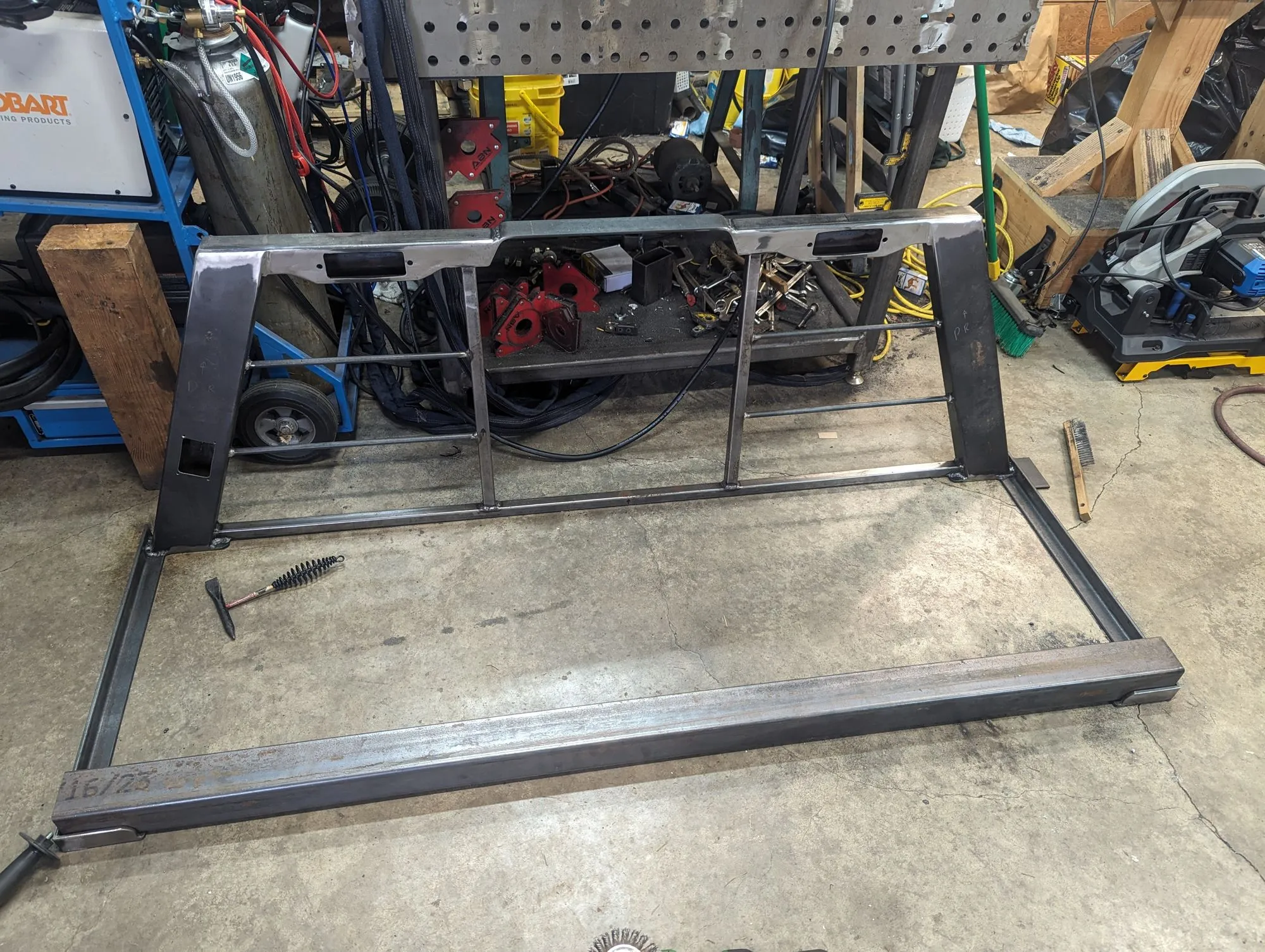 The bare headache rack frame, tacked together on the shop floor